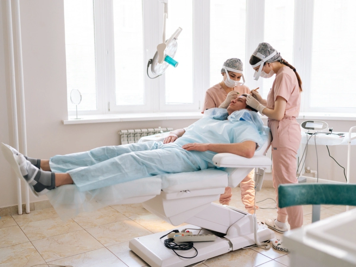 Doctors performing Hair Transplant for Men in Birmingham in a modern clinic for effective hair restoration.